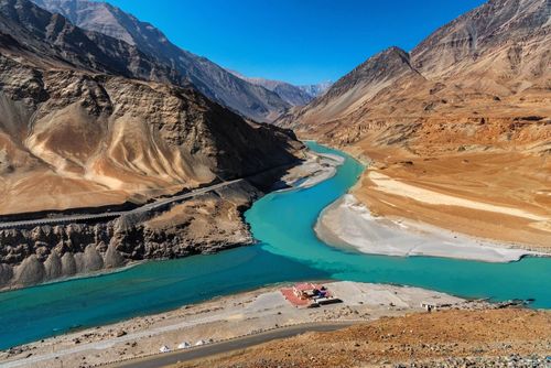Confluence of the Indus and Zanskar Rivers are two different colors of water , between Kargil and leh,India