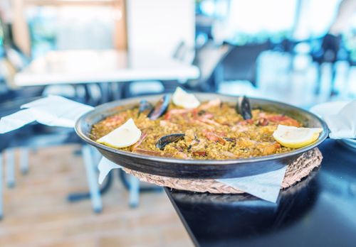 Traditional Paella served at restaurant in Formentera, Spain